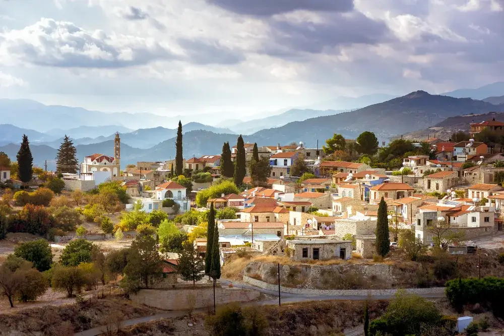 Very muggy morning with the town of Kato Drys pictured below a big cloud during the worst time to visit Cyprus