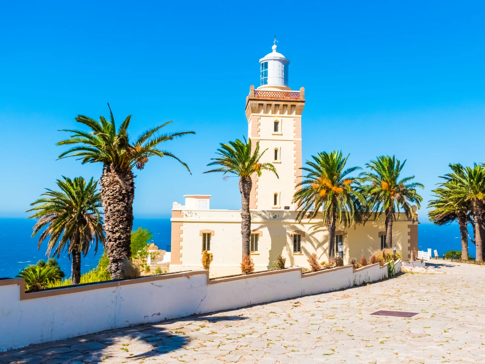 Gorgeous lighthouse of Cap Spartel on the coast of Gilbraltar during the best time to visit Morocco