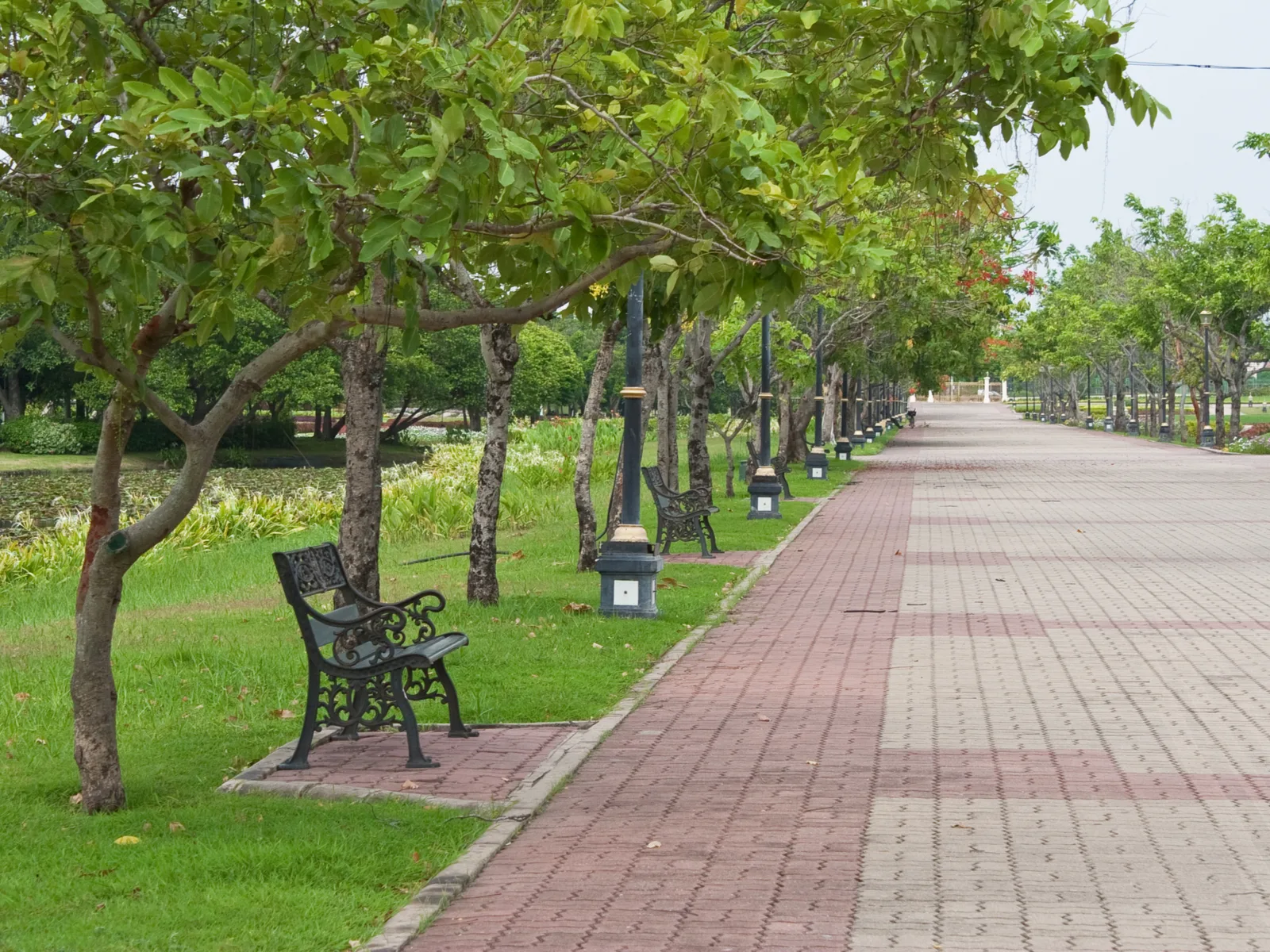 Benches and a park with a brick path for a piece on Is Atlanta Safe