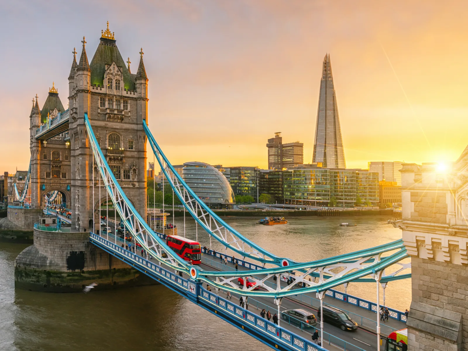 Sun rising over London Tower Bridge during the best time to visit London