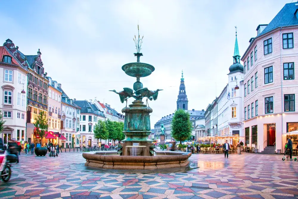 Stork fountain in the middle of the town square in Copenhagen in Denmark for a piece on the best time to visit the country