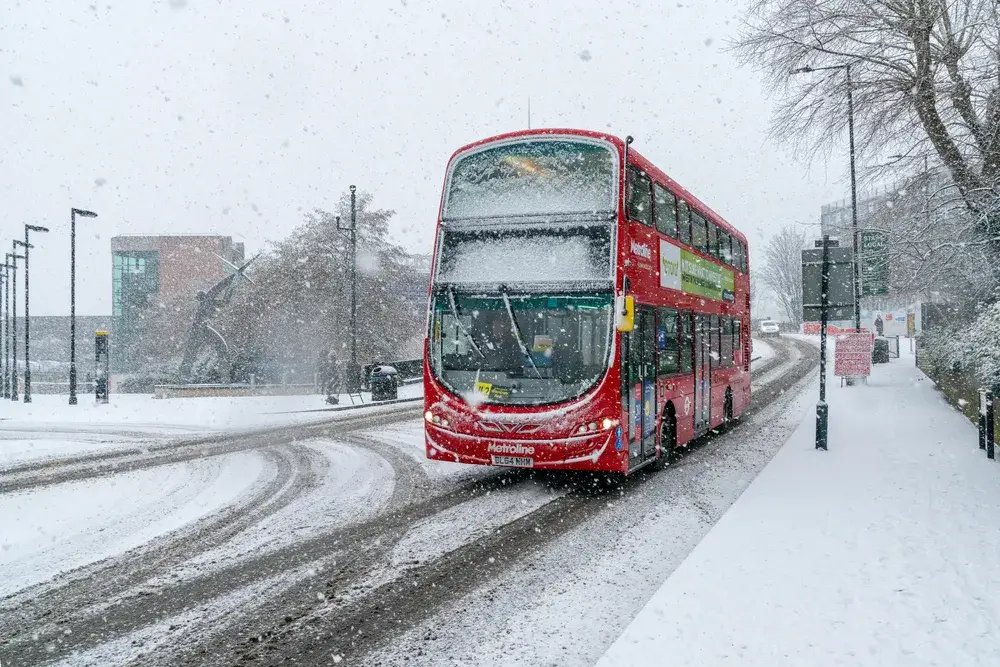 Bus in London pictured on a grey, cloudy day during December, the worst overall time to visit England