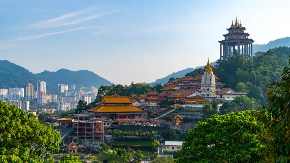 Kek Lok Si Temple skyline against a blue sky on a nice day for a frequently asked questions section on the best time to visit Malaysia