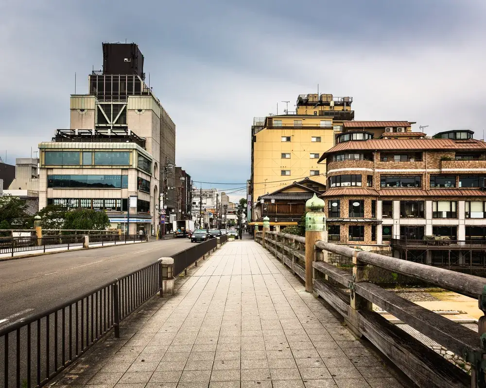 Cloudy and gloomy morning over the Sanjo Ohashi Bridge pictured for a guide to whether Kyoto is safe to visit