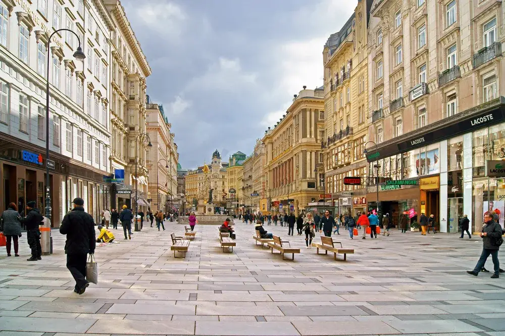 Cloudy day in the winter in Vienna, as seen from the POV of someone walking in a courtyard, pictured for a piece titled is Austria safe to go to this year