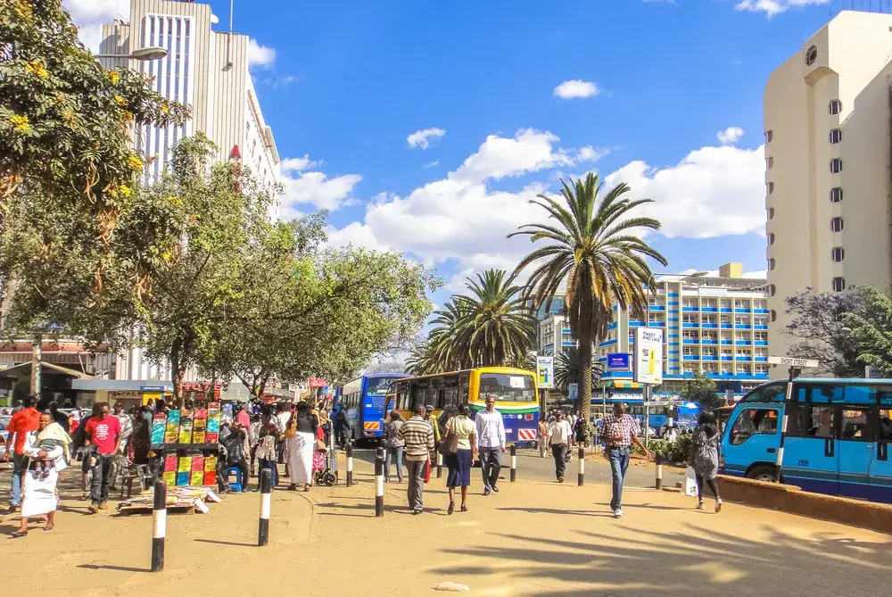 People in a crowded city square in Nairobi during the cheapest time to visit Kenya