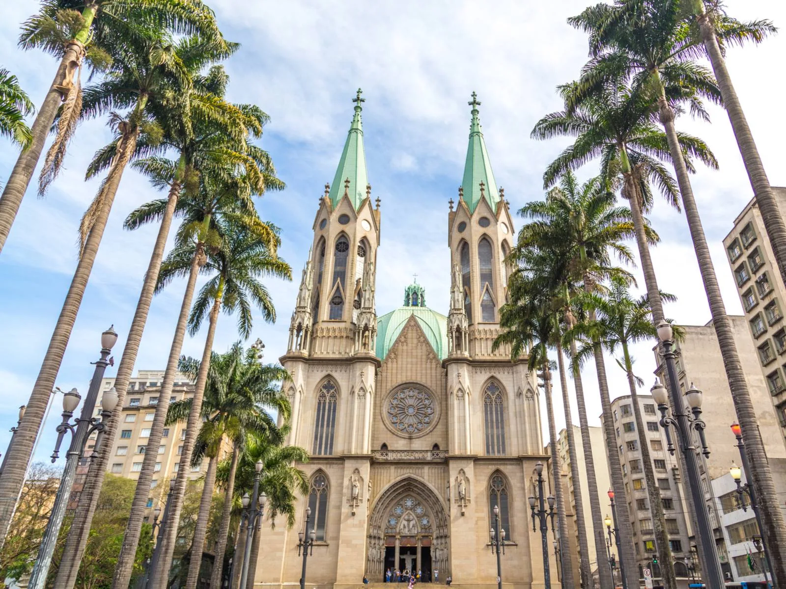 For a piece titled best time to visit Brazil, the Se Cathedral in Sao Paulo pictured against the cloudy sky