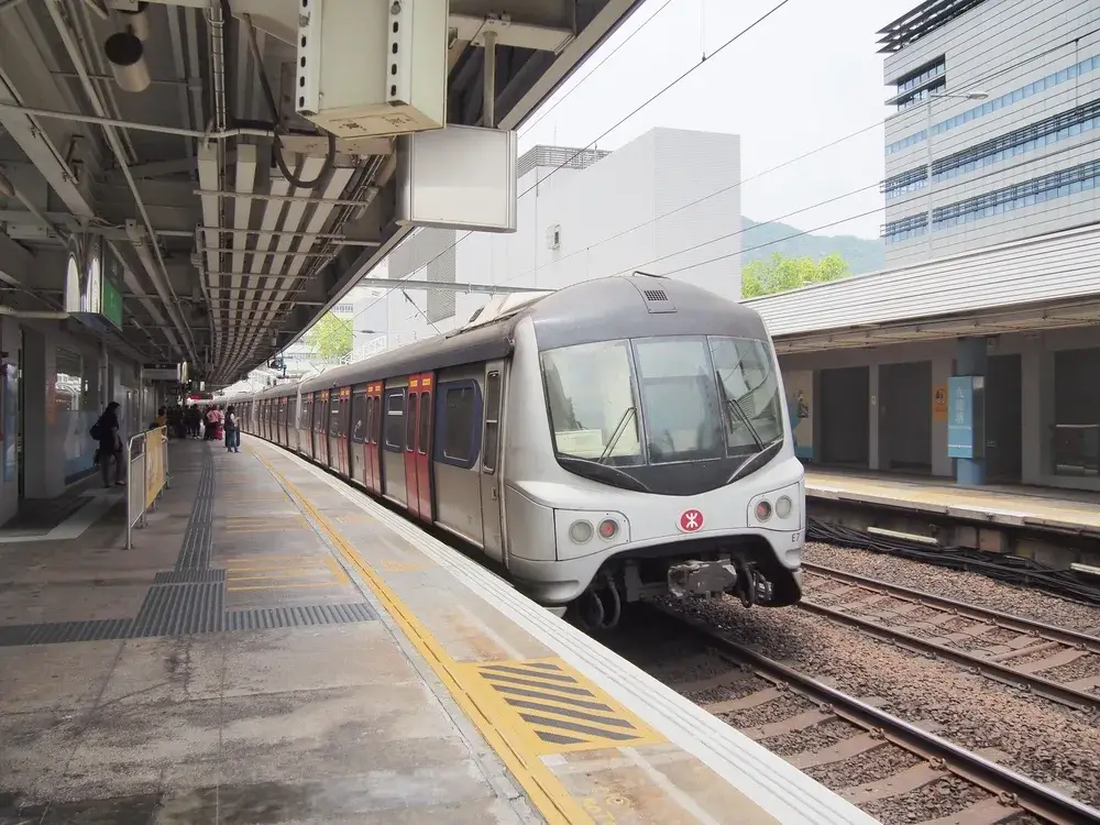 Light rail train on tracks during the best time to visit Hong Kong