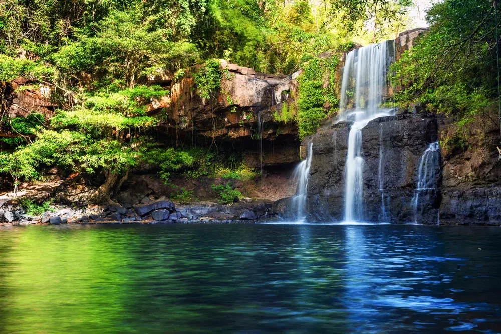 A gorgeous waterfall tucked far inside the rainforest, as seen during the best time to visit the Amazon