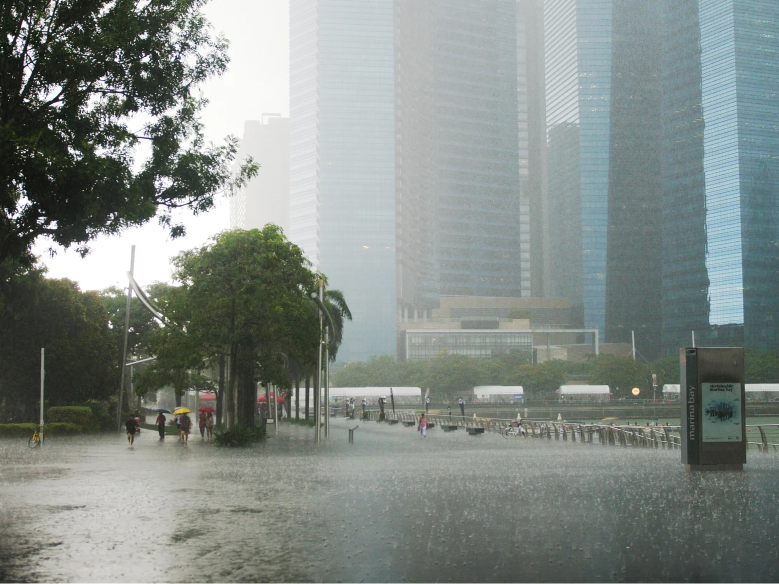 Rain falling in the center of the city during the worst time to visit Singapore, monsoon season