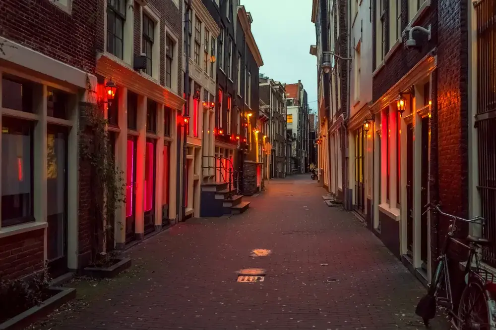 The Red Light District where sex workers congregate as a place to avoid for a piece on Is Amsterdam Safe