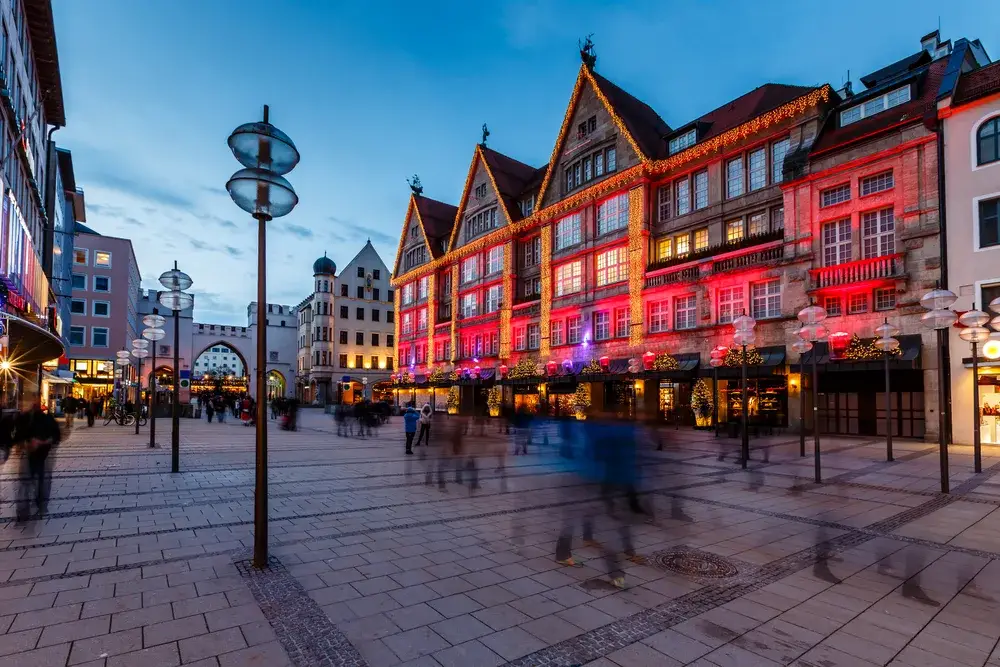 Night view of Karlsplatz Gate and the Neuhauser Street in Austria, one of the places to avoid at night