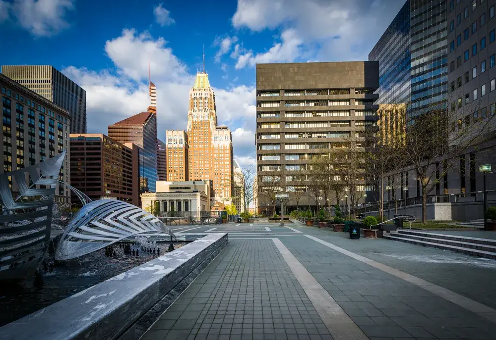 Buildings surrounding a concrete plaza in downtown area for a piece on Is Baltimore Safe