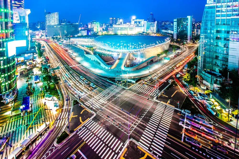 Dongdaemun Design Plaza lit up at night during January shows the cheapest time to visit Seoul