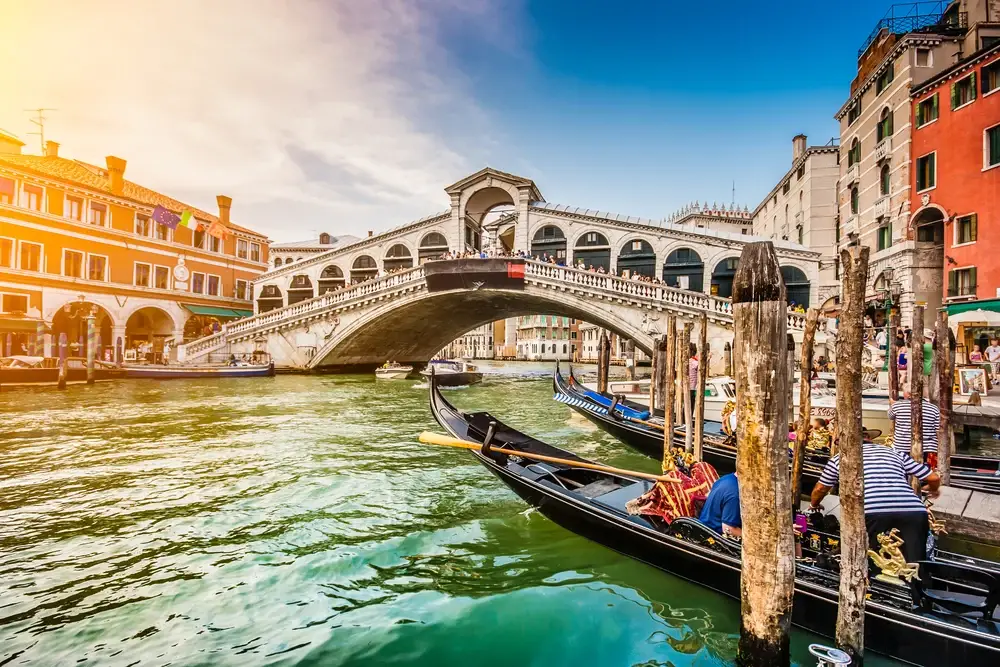 Canal Grande from the Rialto Bridge at sunset during the least busy time to visit Venice