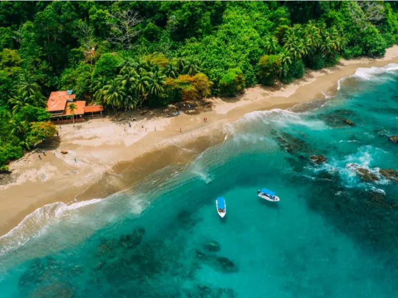 Aerial view of the best time to visit Cost Rica featuring a gorgeous and warm beach