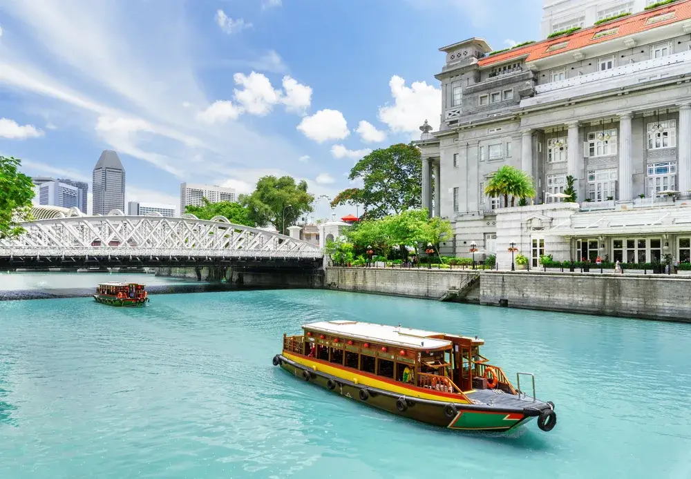 Traditional tourist boats on the Singapore River in downtown for a piece on Singapore safety for tourists