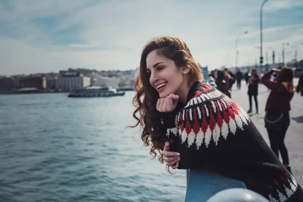 Young tourist looking at the Galata Bridge to show that Istanbul is safe to visit