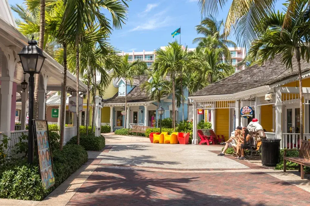 Empty streets of a resort with shops on either side pictured during the least busy time to visit Nassau