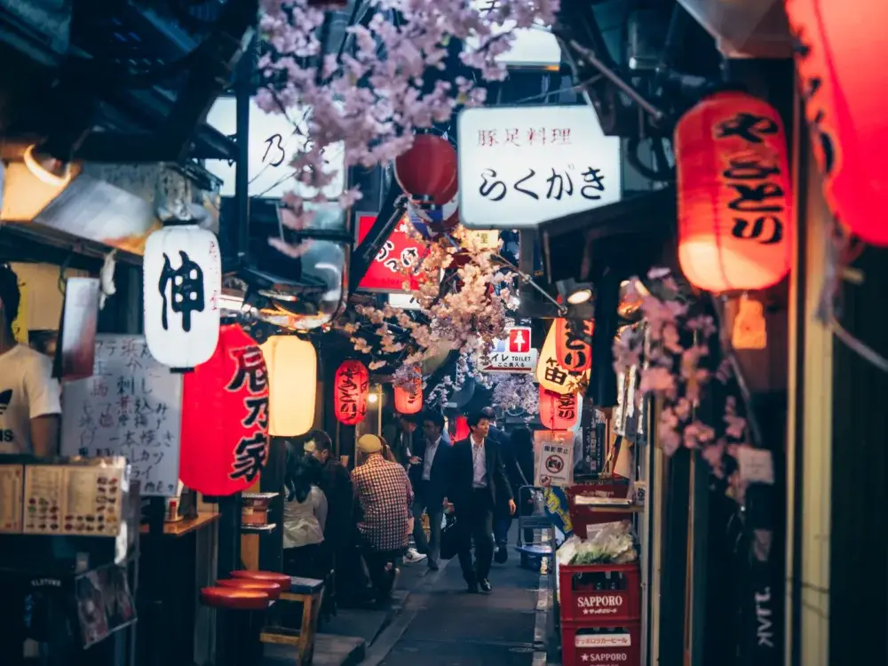 Various tourists sitting in the Shinjuku district during the least busy time to visit Japan